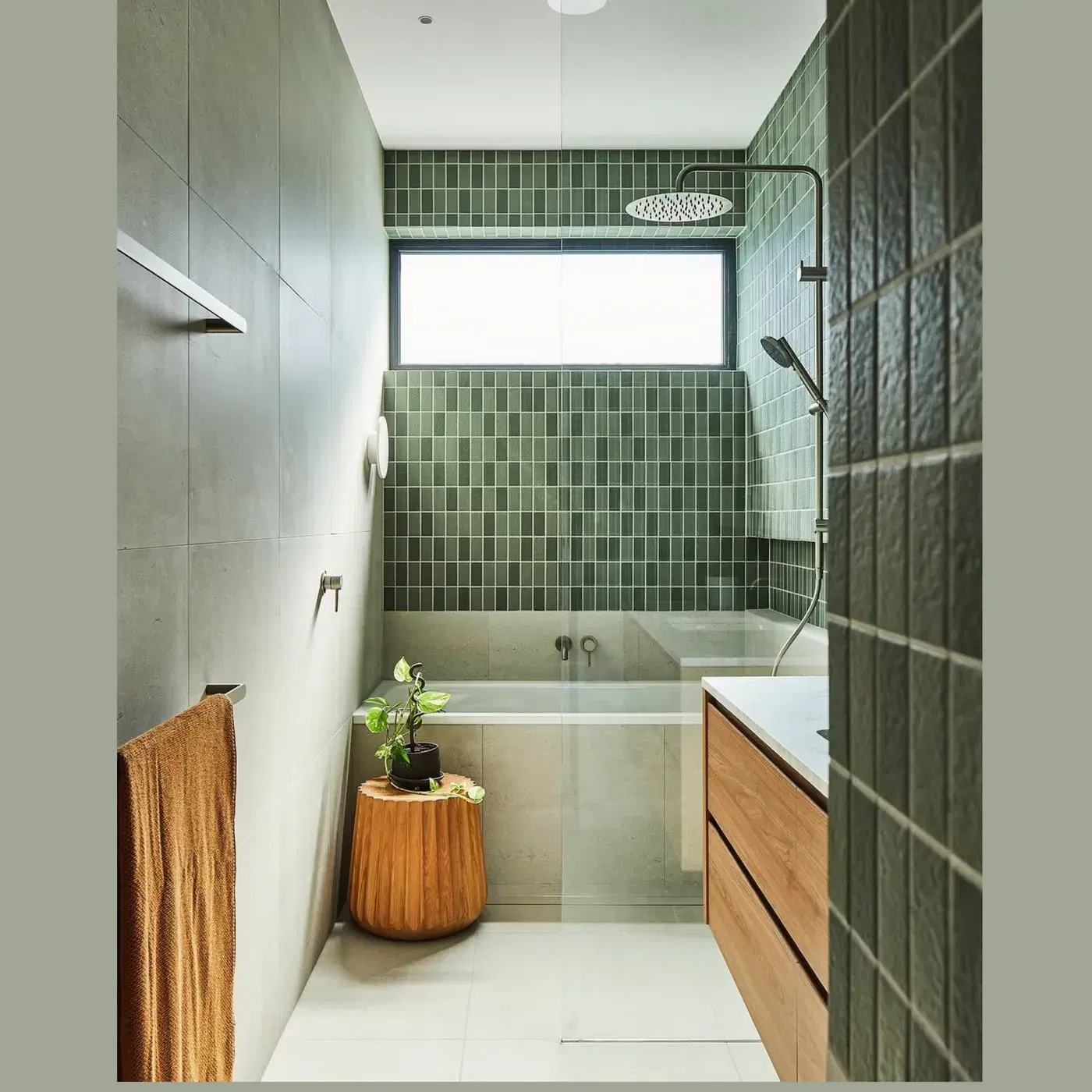 Green-tiled bathroom interior designed with STYLY